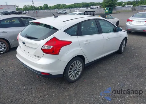 2012 Ford Focus Titanium z USA, uszkodzony, nr VIN 1FAHP3N2XCL365935